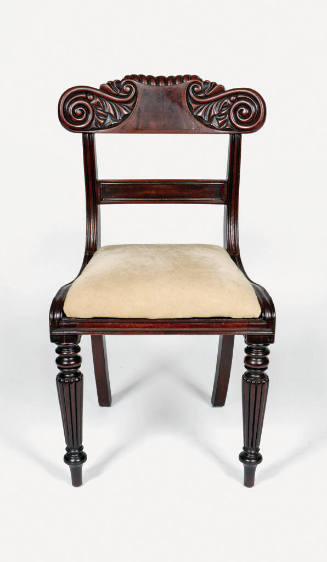 A side chair with a carved mahogany crest rail terminating in two scrolls, square back legs, ro…