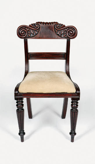 A side chair with a carved mahogany crest rail terminating in two scrolls, square back legs, ro…