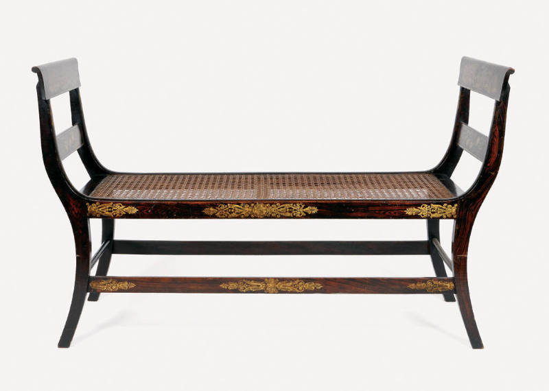 One of a pair of window benches from a suite of high-style, ebonized and rosewood-grained mahog…