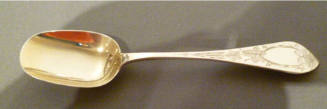 A Victorian sterling silver tea caddy scoop with long handle and lightly gilt bowl. Handle has …