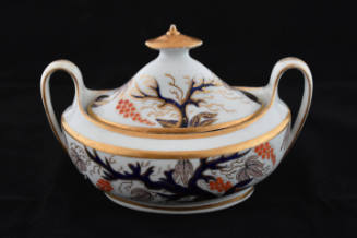 A sugar bowl from a twenty-one-piece tea service characterized by a tree and its base leaves in…