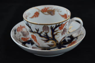 One of eight sets of teacups and saucers from a twenty-one-piece tea service characterized by a…