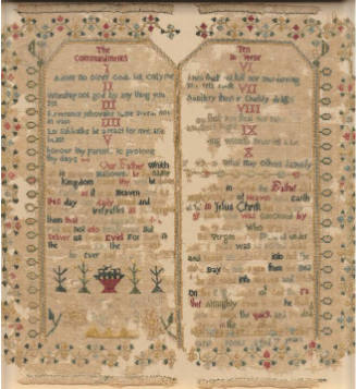 A needlepoint or cross-stitch sampler of the Ten Commandments with a green and red floral borde…